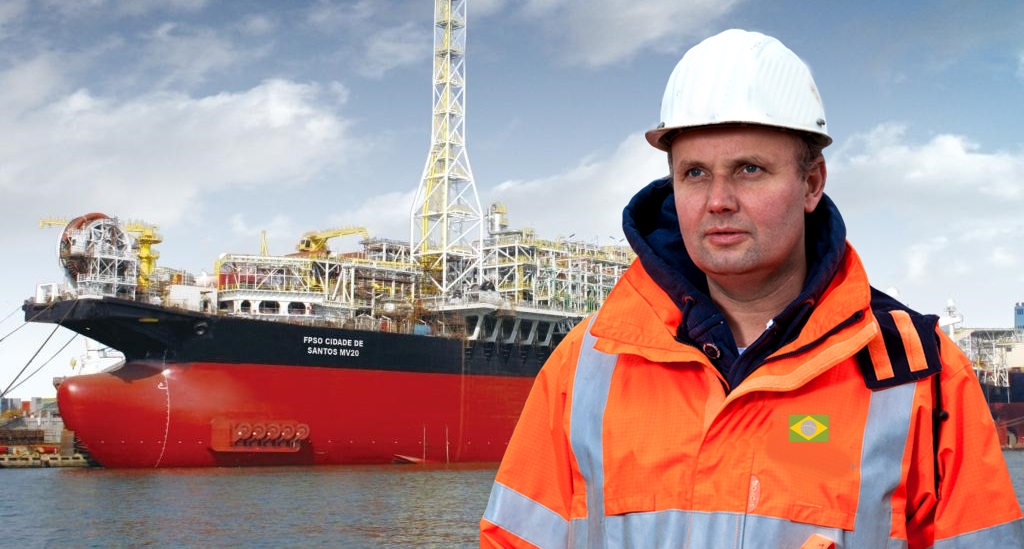 Man offshore oil lookng to horizon