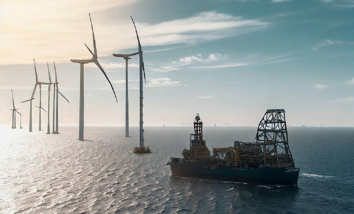 plataforma de petróleo perto de torres para geração de energia eólica