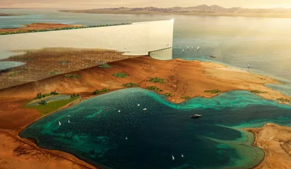 El megaproyecto Neom, en Arabia Saudita, es una ciudad futurista de £ 400 mil millones que se está construyendo en el desierto para albergar a millones de personas. Con un enfoque en la innovación y la sostenibilidad, incluye «The Line», una ciudad lineal sin coches y movida a energía 100% renovable.