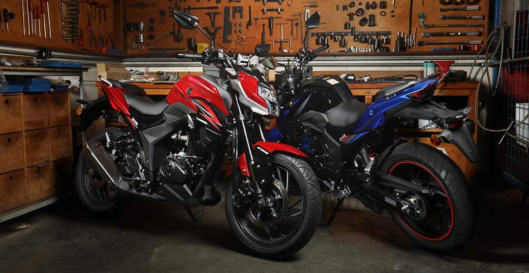 La nueva DR 160 2026 llega con precio bajo y visual renovado, pero sin ABS, sorprendiendo a los fans y alterando el mercado de motos urbanas.