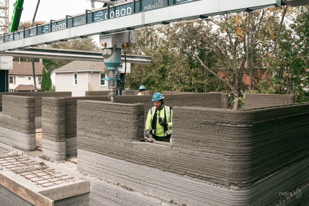 A Máquina que Imprime Prédio com Lixo: Como a Construção 3D com Resíduos e Plástico Reciclado Está Virando Realidade em 2025