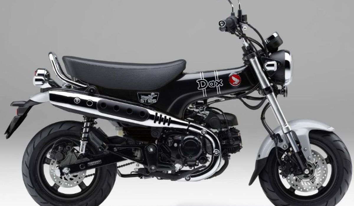 Honda Dax 2026 resgata visual retrô dos anos 70, mantém mecânica simples e impressiona com consumo oficial de até 66,7 km/l. (Imagem: Divulgação/Honda)