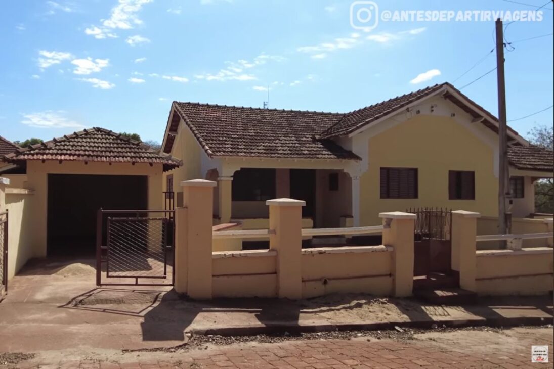vila com mais de 200 casas em Garapava com história da usina Junqueira, aluguel de R$ 500 a R$ 800 e ruas de pedra preservadas, com praça central, igreja e memória ferroviária mantendo o conjunto vivo.