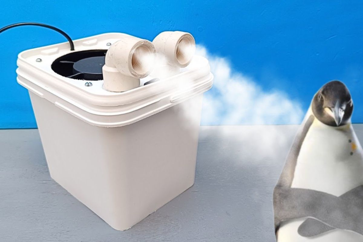 ar-condicionado caseiro com ventoinha cooler usa algodão no congelador e monitora temperatura: o vídeo mostra queda para 26° e detalha montagem com interruptor e duto 90°.