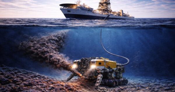 Navio de pesquisa japonês na superfície do oceano conectado por tubulação a veículo submarino que realiza extração de sedimentos ricos em terras raras a 6.000 metros de profundidade em Minami Torishima.