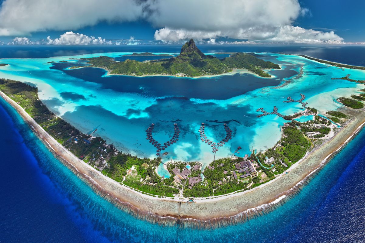Bora Bora revela como vulcão, corais, logística e Pacífico moldam uma ilha de beleza extrema que depende de engenharia invisível para continuar viva.